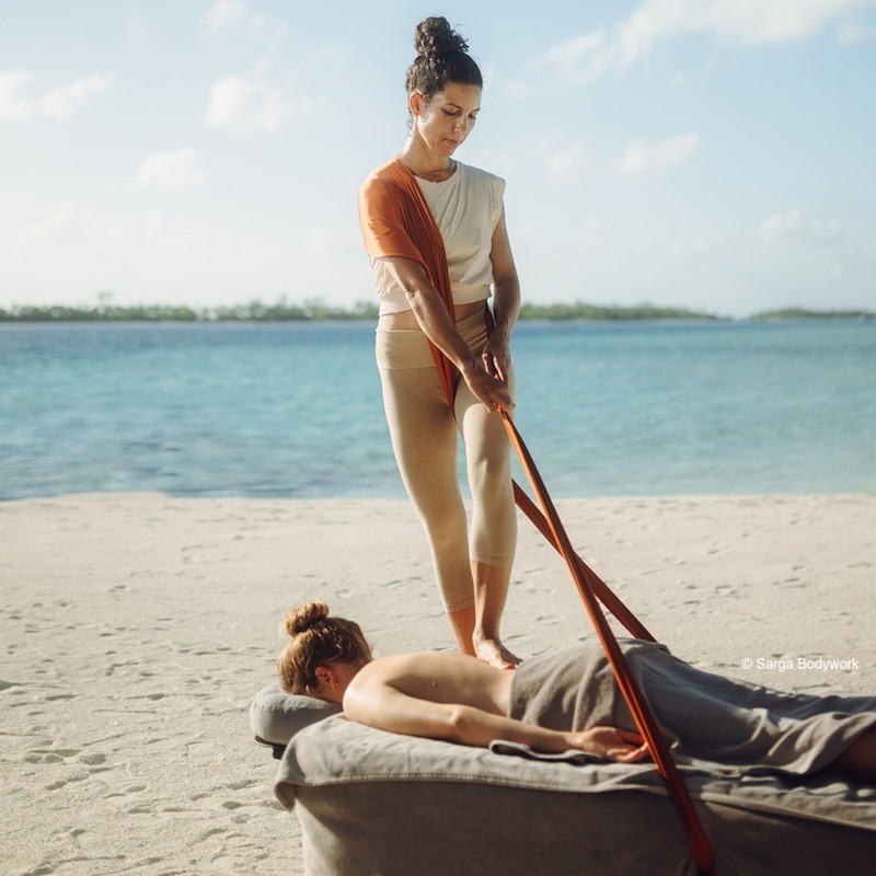 Massage Sarga Bodywork avec les pieds à Confignon, Genève